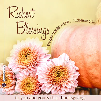 Free SarahJean Thanksgiving eCard with a Christian message entitled 'Rich Blessings'. Image of flowers by large pumpkin.